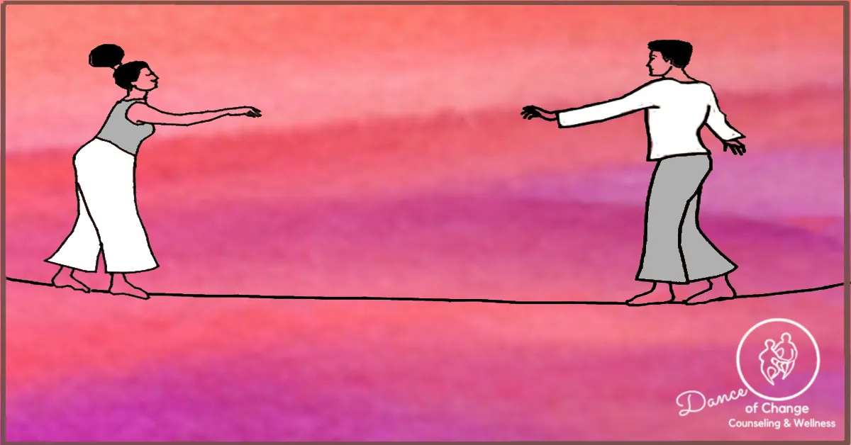 Couple on a tightrope representing how couples feel when they start Marriage Therapy in St. Louis, MO